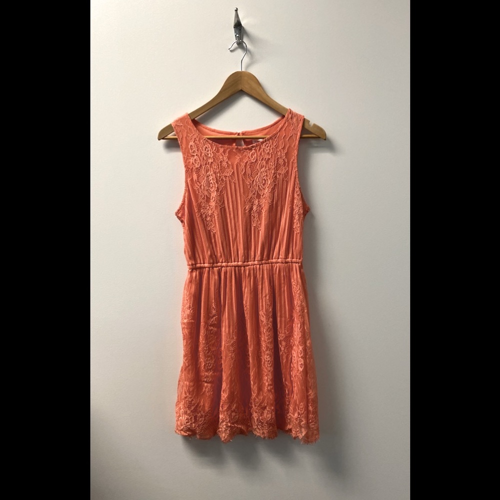 Lacy dress with elastic waist. Peachy color.